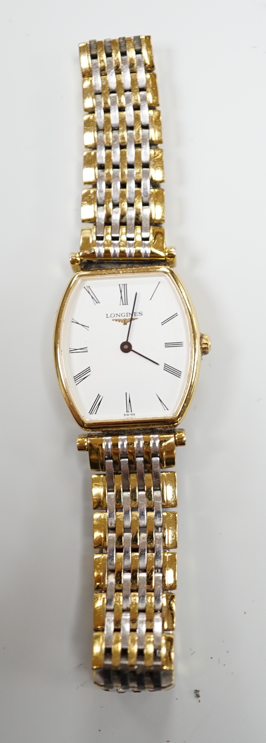 A lady's steel and gold plated Le Grande Classique de Longines quartz wrist watch, no box or papers.